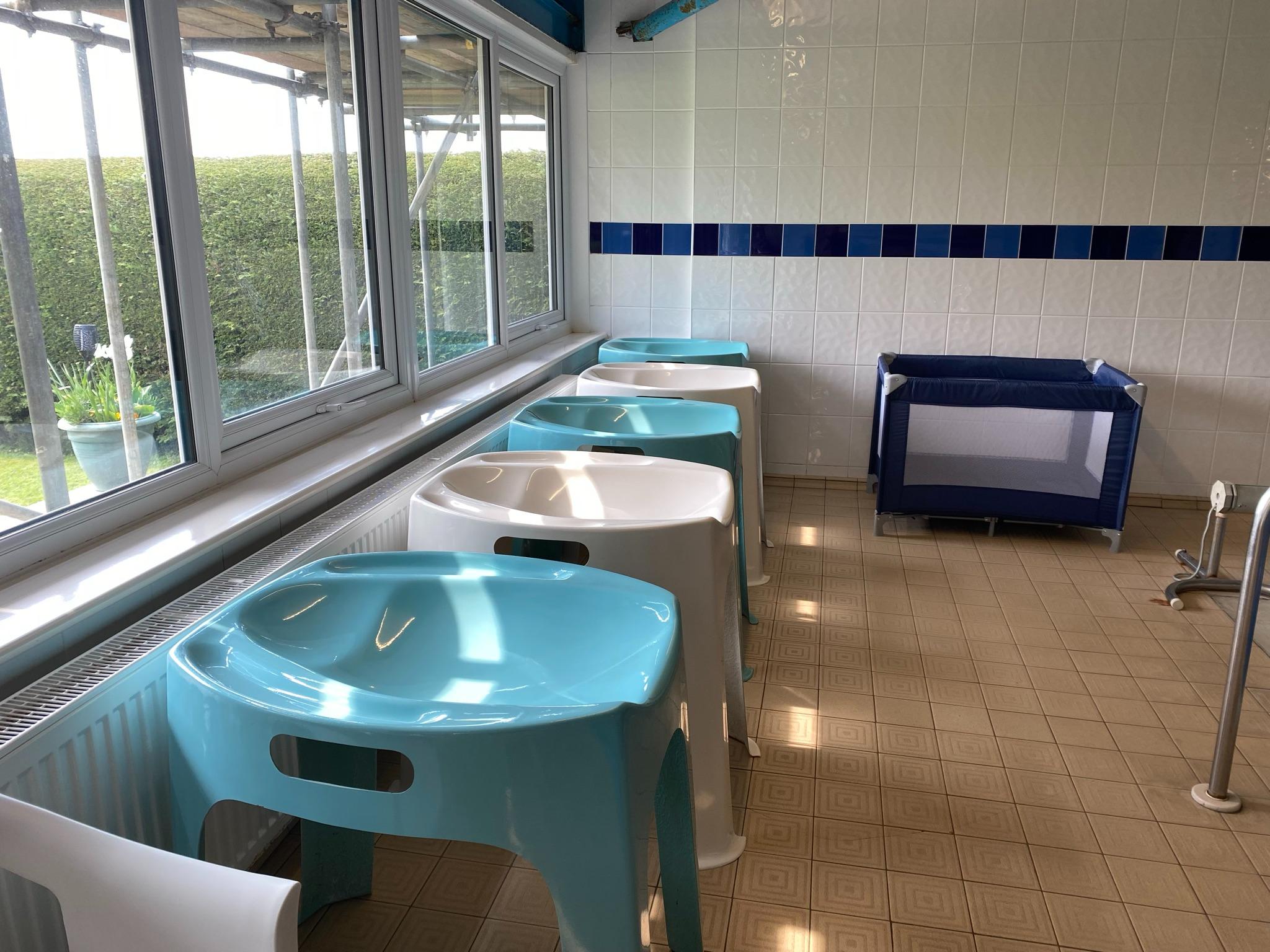 baby changing poolside at Small Splashes swimming school